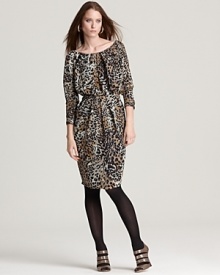 A vivid animal print enlivens sumptuous silk on this Anne Klein New York dress, designed in a draped and pleated silhouette that cinches in at the waist for a flattering finish.