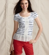 Stripes get sweet in this easy top from Tommy Hilfiger. A ruffled lace hem and lace at the center front adds a girly touch to this tee.