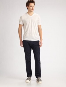 A classic straight-leg fit sits squarely on the hips with a regular rise and casual, anti-fit. A casual way to wear classic pinstripes, cut with a slimmer, slightly tapered silhouette in fabric-dyed cotton canvas chino. Button fly Side slash, back flap pockets Inseam, about 34 Cotton Machine wash Imported 