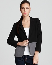 In minimalist black and grey, this Aqua blazer offers sleek, modern style that seamlessly transitions from day to night.