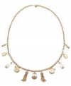 Simply charming. Carolee's trendy and tasteful long necklace is adorned by glass pearls and tassel charms. Set in antique gold-plated mixed metal. Approximate length: 34 inches. Approximate drop: 1-1/4 inches.