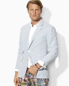 Light-as-air seersucker cotton lends preppy sensibility to a handsome sport coat, cut in a trim, modern silhouette for impeccable style.