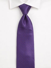 Mini circle pattern accents this beautifully crafted Italian silk tie.About 3½ wideSilkDry cleanMade in Italy