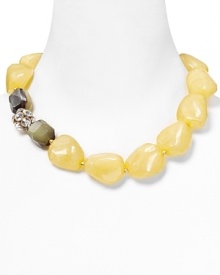 Work a bohemian neckline with this chunky bib necklace from Aqua, boasting multi colored stones. In a bold shape and cool palette, it will instantly update looks for this season.