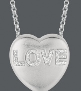 Say it loud and clear. Sweethearts' adorable heart-shaped pendant expresses more that just great style with the word LOVE written in round-cut diamonds (1/10 ct. t.w.) across the surface. Pendant crafted in sterling silver. Copyright © 2011 New England Confectionery Company. Approximate length: 16 inches + 2-inch extender. Approximate drop: 5/8 inch.