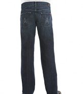 7 For All Mankind bootcut jeans. In a dark wash with slight fading and distressing. Zip fly and button closure. Back pocket features 7 for All Mankind's classic A embroidery. Zip fly.