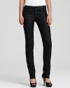 Glossy coated denim lends ultramodern allure to Joe's Jeans Chelsea skinny jeans.