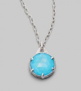 From the Eclipse Collection. A vividly colored, richly faceted turquoise sits in a sterling silver pronged setting with a graceful fluted texture and accents of sparkling white sapphire. Turquoise White sapphire Sterling silver Chain length, about 17 Pendant diameter, about ¾ Lobster clasp Imported