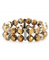 Double take. Two-tone bronze and silver faceted cherry beads and a double-row silhouette stand out on this stylish stretch bracelet from Kenneth Cole New York. Embellished with sparkling crystal accents, it's crafted in hematite tone mixed metal. The stretch design makes it a comfortable, effortless choice. Approximate length: 7-1/2 inches.