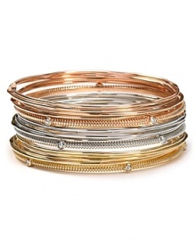 Stacked jewels reign supreme this season, so slip on this set of metallic bangles from RJ Graziano as an effortless way to tap into the trend.