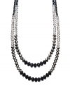 Add a designer element to your look in dramatic, dark hues. c.A.K.e. by Ali Khan necklace features two, graduated rows of jet and hematite-colored glass beads with a mixed metal clasp. Approximate length: 24 inches + 3-1/4-inch extender.