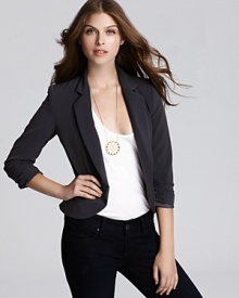 The iconic workday blazer, given a chic polish by Aqua in a cropped silhouette with ruched sleeves. Wear over a white tank and black jeans, then add an oversized pendant for bold panache.