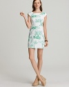 A playful toile print covers this charming Lilly Pulitzer cap sleeve dress for a modern look with vintage appeal.