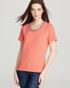 Spruce up your wardrobe with this BASLER tee. A warm coral background showcases an intricate stone-beaded neckline for a piece that adds elegance to the everyday.