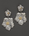 Ethereal flowers captured in silver and 18K gold. By Buccellati.