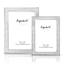 Argento Nail Head sterling silver frames. Dual easel for portrait and landscape tabletop display. Solid .925 fine sterling silver. Clear lacquered for tarnish free appearance.