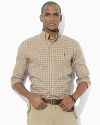 A preppy madras pattern enlivens a classic-fitting sport shirt, tailored from soft cotton twill for comfortable style.