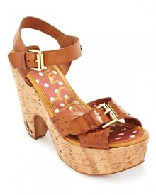 A clog-inspired silhouette in cork from Sam Edelman. Gold-tone buckles and perforated details lend finishing touches.