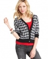 Love to layer? This houndstooth-print cardigan from Confess brings bold style to your jeans and tee uniform!