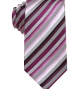 In a warm palette, this striped skinny tie from Alfani brightens up the concrete jungle.