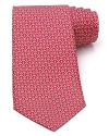 A hole in one! This classic silk tie from Salvatore Ferragamo shows off a playful golfball and tee print.