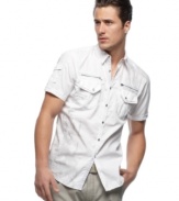 Shorten your list of must-haves this season with this comfortable woven shirt from INC International Concepts.