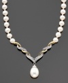 A pièce de résistance; this stunning necklace features cultured freshwater pearls (8-10 mm) and round-cut diamonds (1/10 ct. t.w) set in 14k gold and sterling silver. Approximate length: 17 inches. Approximate drop: 1-1/2 inches.