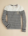 Juicy Couture toys with the classic nautical look, mixing in a solid yoke and goldtone accents at the shoulder and chest, for a sweet style that keeps its sea-legs.