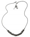 Simple yet stunning. A sparkling row of black crystals adorns this chic chain necklace from Fossil. Crafted in ruthenium tone mixed metal, it includes a lobster claw closure. Approximate length: 18 inches + 2-inch extender.