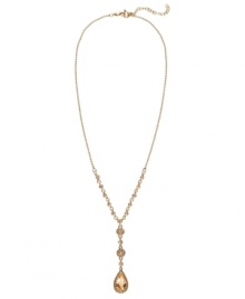 Shine like the sun in this glittery goldtone pendant by Monet. In goldtone mixed metal and topaz-toned crystal accents. Approximate length: 16-18 inches. Approximate drop: 1 inch.