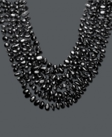 Let eight luxurious layers adorn your neckline. Silky onyx chips (6-8 mm) form eight graduated strands that make a bold, stylish statement. Approximate length: 18 inches.