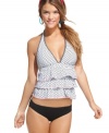 Beautify the beach with Coco Rave's flirty ruffled tankini top! Bra sizing allows for a fabulous fit, too.