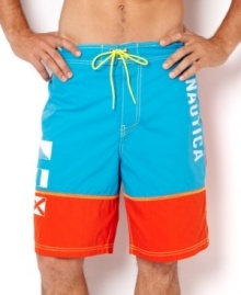 Get colorful by water in these bright board shorts by Nautica.