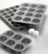 Pop 'em out of the molds and into your mouth with this 6-cup muffin pan! Features include nonstick interiors and exteriors for easy cleaning, no-hassle food release and optimum baking performance. Reinforced nonstick surface also offers long-lasting durability. Constructed of aluminized steel to resist rusting. Rolled edges are reinforced with tinned steel wire for added strength. Oven safe to 450 degrees. Lifetime warranty. Model BW5006.