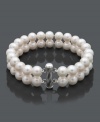 Provide your wardrobe with a timeless piece. This sophisticated bracelet features two rows of pretty cultured freshwater pearls (8-1/2-9-1/2 mm) in a sterling silver setting. Approximate length: 8 inches.