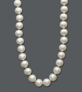 Timeless elegance and a gift to last a lifetime. This sophisticated strand of cultured freshwater pearls (9-10 mm) is set in 14k gold. Approximate length: 18 inches.