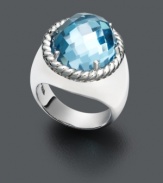 Get ready for an evening of cocktails and conversation. This stylish statement ring adds a subtle splash of color with an oval-cut blue topaz (11-8/10 ct. t.w.) set in polished sterling silver with an intricate rope edging. Size 7.