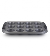 For crumb-free muffins that will make 'em go mmm, Anolon's muffin pan is a must-have!  New proprietary coating ensures superior release and makes cleanup a snap. Silicon-enhanced handles are steady and slip-free, while the pan's substantial weight provides durability and helps prevent warping.