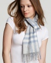 A stylish check printed scarf that is so soft, you won't want to take it off.