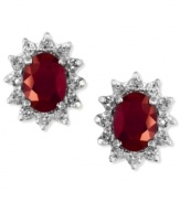 Regally red. EFFY Collection's stunning stud earrings feature oval-cut rubies (2-1/10 ct. t.w.) surrounded by halos of round-cut diamonds (1/2 ct. t.w.). Set in 14k white gold. Approximate length: 1/3 inch. Approximate width: 3/8 inch.