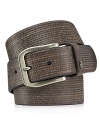 This handsome leather belt sports embossed stripes, bring a uniquely textured look to your everyday wardrobe.