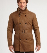 A double-breasted coat with a classic belted look and convenient double back vent.Stand collarBelted styleSlash pocketsDouble back ventAbout 33 from shoulder to hem80% cotton/20% nylonDry cleanMade in USA