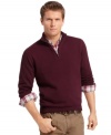 Paired with any patterned shirt, this solid Izod sweater is the perfect finishing piece.