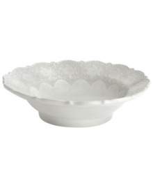 Handcrafted in the Italian tradition, the Merletto serving bowl is intricately embellished with a lacy floral texture and painted a creamy antique white. An elegant companion to Arte Italica dinnerware.