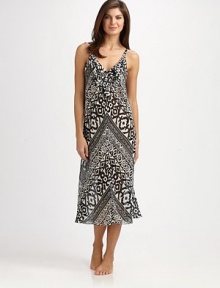 EXCLUSIVELY AT SAKS. Vivid and bold, a tribal-inspired print covers this sleeveless design with feminine ruffles. V-neckSleevelessRuffles at necklineFlared hemAbout 51 from shoulder to hemPolyesterMachine washImported