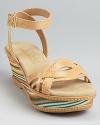 Cheerful stripes adorn the wedge of these Splendid sandals, crafted in smooth leather with a soft suede foot bed.