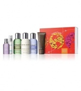 Travel is all wrapped up. When you're embarking on a journey, this refreshing six piece collection for body, skin and senses is vital. Concentrated plant and mineral actives and high-impact aroma oils, including cempaka leaf oil, ardeche ambrusca grapeleaf, Chinese yuan zhi extract and malachite, help to refresh, hydrate and soothe at every stage of your trip. This in-flight friendly travel set comes complete with a clear travel bag. Made in England. 