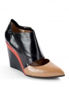 THE LOOKContrast point toeCutout vampConcealed elastic goring on the sidePadded insoleNotched back colorblock wedge, 4 (100mm)THE MATERIALColorblock leather upperLeather lining and soleORIGINMade in Italy