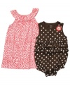 Patterned princess. Jazz up any of her outfits with a darling design from this Carter's romper and dress set.