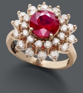 Ignite a style flame in red-hot color inspired by royalty. Effy Collection ring features a round-cut ruby (2-5/8 ct. t.w.) surrounded by a two rows of sparkling round-cut diamonds (1-1/3 ct. t.w.). Ring crafted in 14k rose gold.